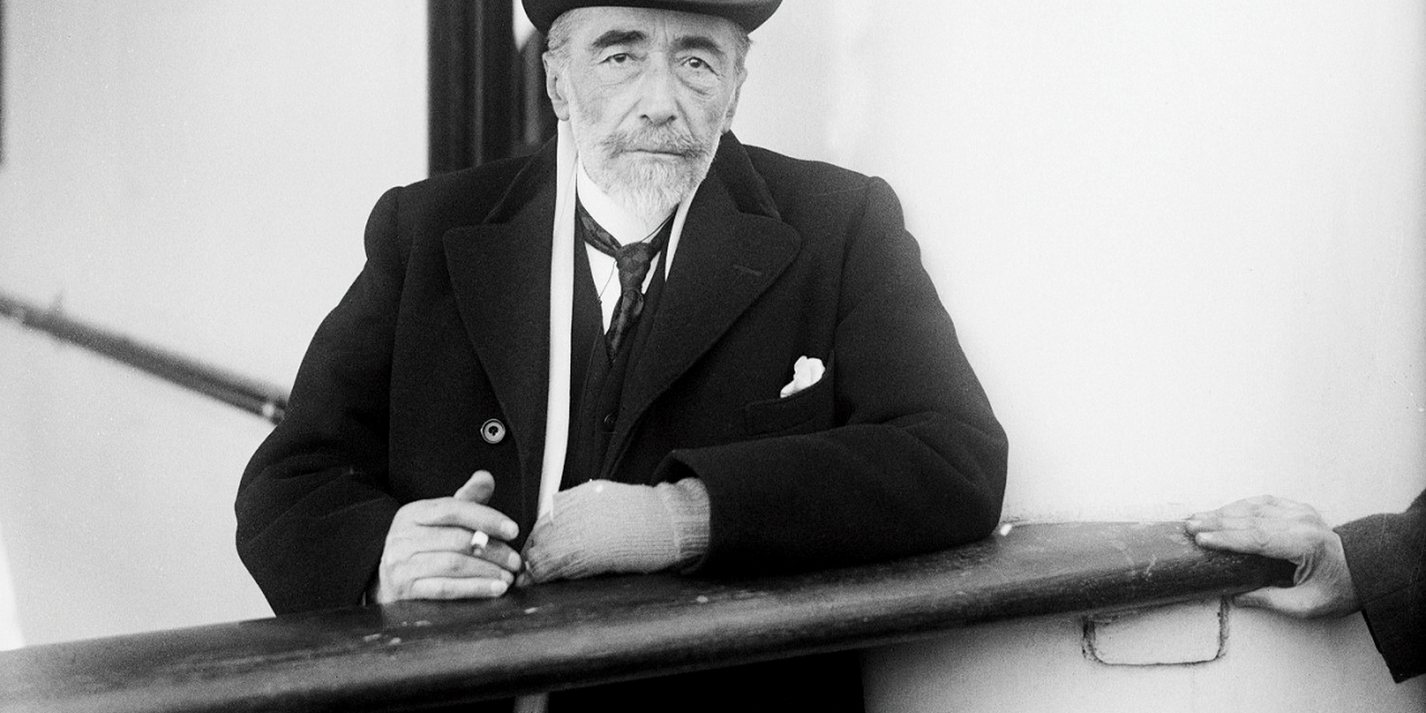 Portrait of Ukrainian-born author Joseph Conrad (1857 - 1924) holding a cigarette.